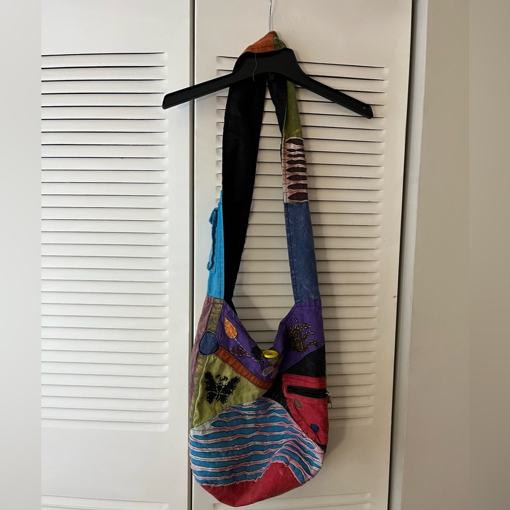 Multi-designed crossbody, bag by Riding International, 100%